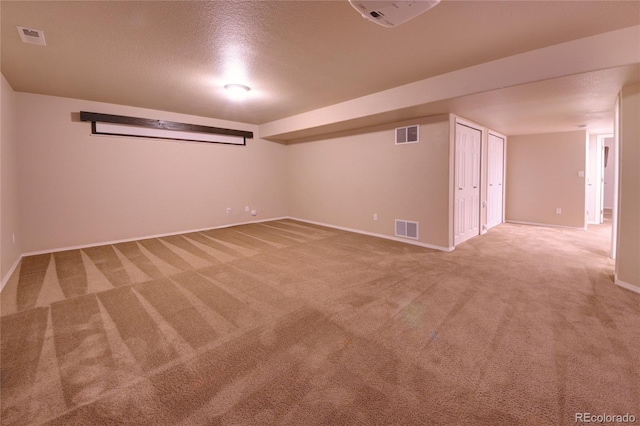 5947 Cumbre Vista Way, Colorado Springs, CO 80924 - spare room featuring carpet and a textured ceiling