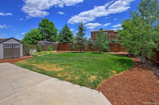 5947 Cumbre Vista Way, Colorado Springs, CO 80924 - fenced backyard featuring a storage unit and a patio area
