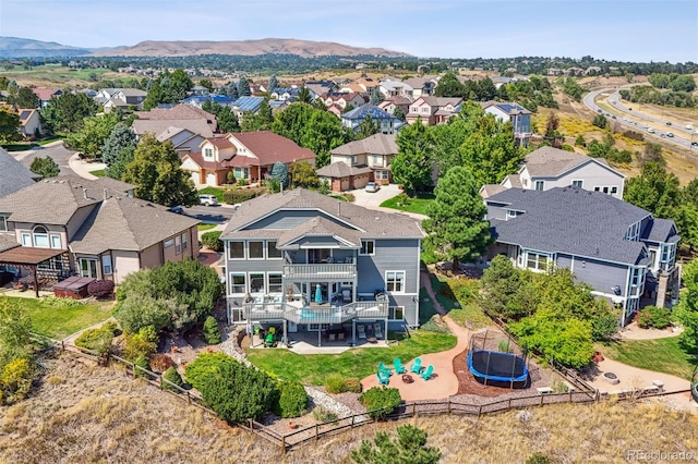 birds eye view of property featuring a mountain view