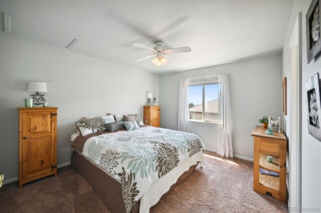 bedroom with attic access, carpet flooring, baseboards, and a ceiling fan