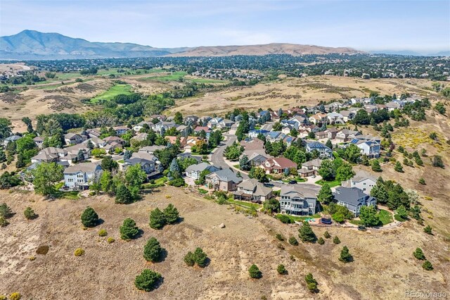 drone / aerial view with a mountain view and a residential view