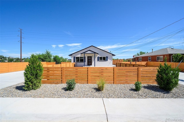 4901 W 11th Ave, Denver, CO 80204 - view of front facade featuring a fenced front yard