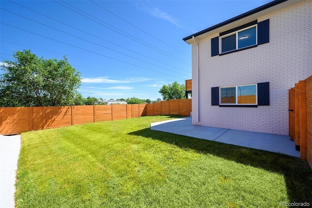4901 W 11th Ave, Denver, CO 80204 - fenced backyard with a patio area