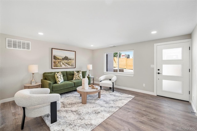 4901 W 11th Ave, Denver, CO 80204 - living area with wood finished floors and recessed lighting