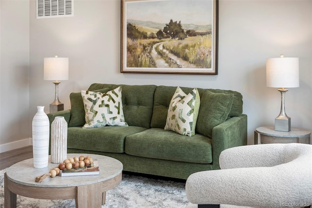 4901 W 11th Ave, Denver, CO 80204 - living room featuring baseboards and wood finished floors