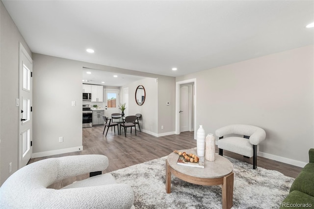 4901 W 11th Ave, Denver, CO 80204 - living area featuring light wood-style flooring and recessed lighting