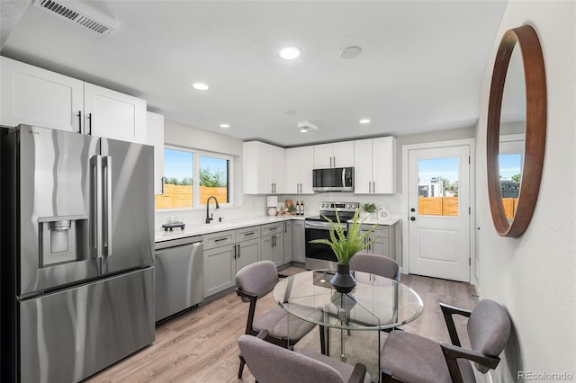 4901 W 11th Ave, Denver, CO 80204 - dining area featuring light wood-style flooring and recessed lighting