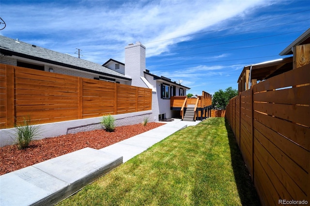 4901 W 11th Ave, Denver, CO 80204 - fenced backyard with a wooden deck