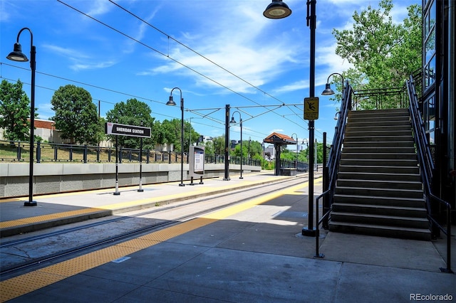 4901 W 11th Ave, Denver, CO 80204 - view of asphalt street with street lighting, stairs, sidewalks, and curbs