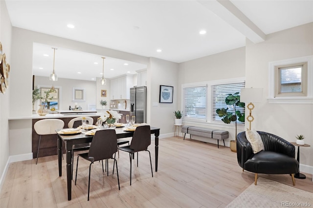 dining room with light hardwood / wood-style flooring