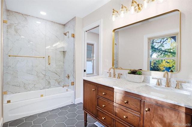 bathroom featuring vanity and enclosed tub / shower combo