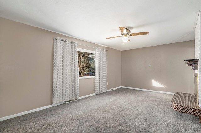 unfurnished living room featuring baseboards, a ceiling fan, and carpet flooring