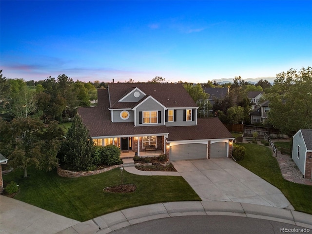 3566 E Meadow Creek Pl, Highlands Ranch, CO 80126 - traditional-style house with driveway, covered porch, and a garage
