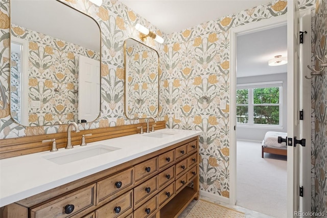 3566 E Meadow Creek Pl, Highlands Ranch, CO 80126 - full bath with wallpapered walls, double vanity, and baseboards