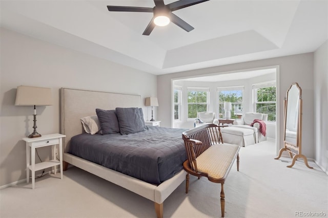 3566 E Meadow Creek Pl, Highlands Ranch, CO 80126 - bedroom with a tray ceiling, light colored carpet, ceiling fan, and baseboards
