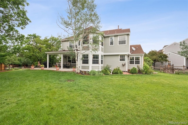 3566 E Meadow Creek Pl, Highlands Ranch, CO 80126 - back of property featuring a patio and a shingled roof