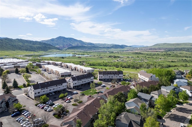 bird's eye view of a water and mountain view