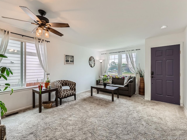 426 N 48th Ave, Brighton, CO 80601 - carpeted living area featuring a ceiling fan and baseboards