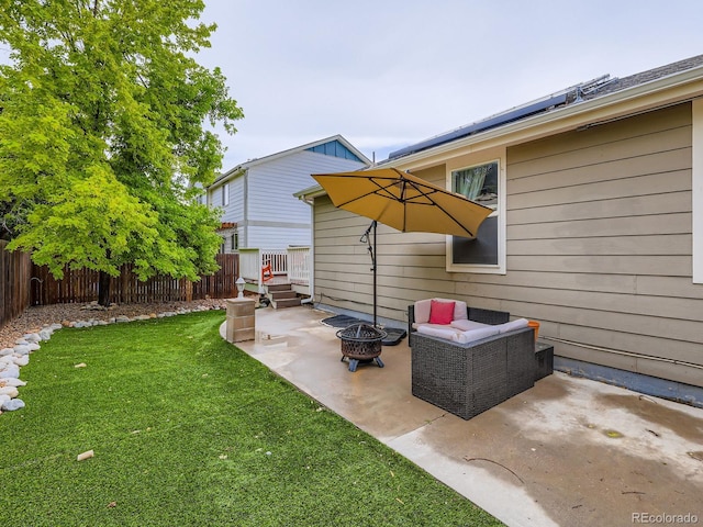 426 N 48th Ave, Brighton, CO 80601 - fenced backyard with a fire pit and a patio