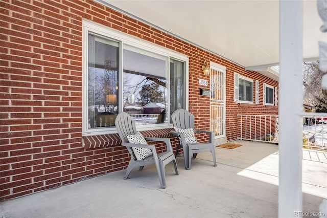 view of patio featuring a porch