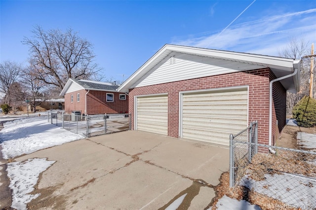 view of property exterior featuring a garage