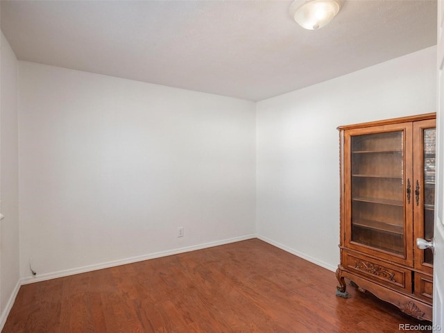 empty room featuring hardwood / wood-style floors