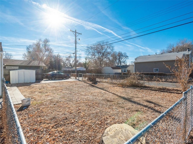 view of yard with a shed