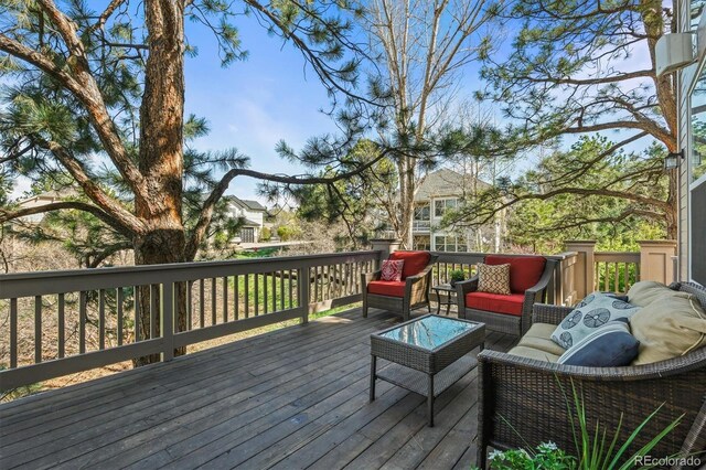 deck with an outdoor hangout area