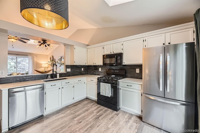 12476 W Prentice Pl, Littleton, CO 80127 - kitchen with black appliances, lofted ceiling, backsplash, white cabinets, and light wood finished floors