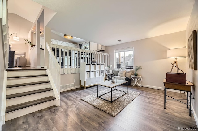 12476 W Prentice Pl, Littleton, CO 80127 - living room featuring stairs and wood finished floors