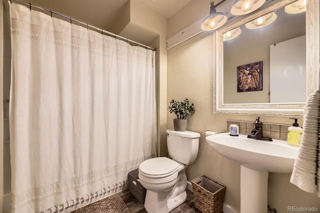12476 W Prentice Pl, Littleton, CO 80127 - bathroom featuring toilet and a shower with curtain