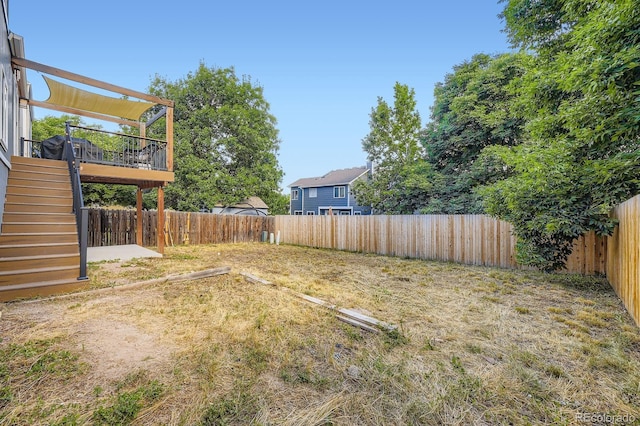 12476 W Prentice Pl, Littleton, CO 80127 - fenced backyard featuring stairs and a deck