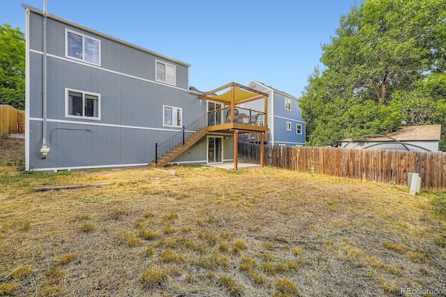 12476 W Prentice Pl, Littleton, CO 80127 - rear view of house featuring stairway and a deck