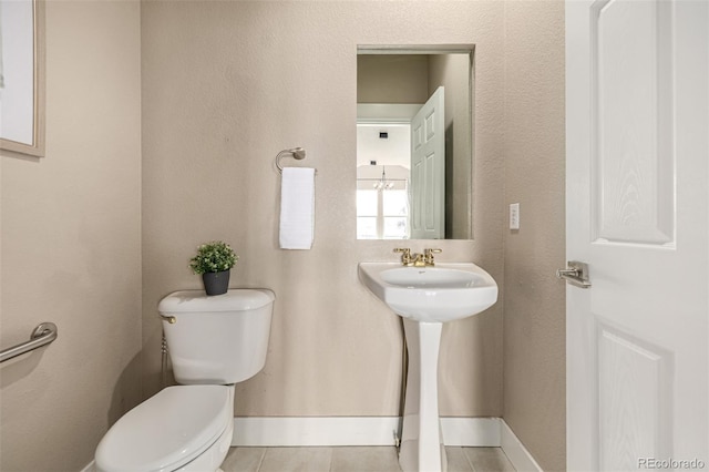 16434 Homestead Ct, Parker, CO 80134 - half bath with tile patterned flooring and toilet