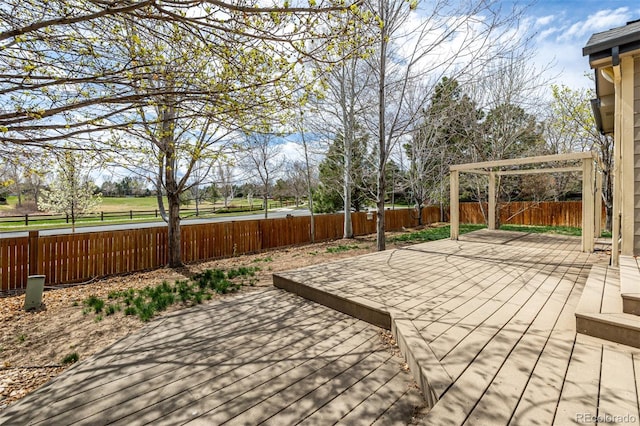 16434 Homestead Ct, Parker, CO 80134 - wooden terrace with a patio area and a fenced backyard
