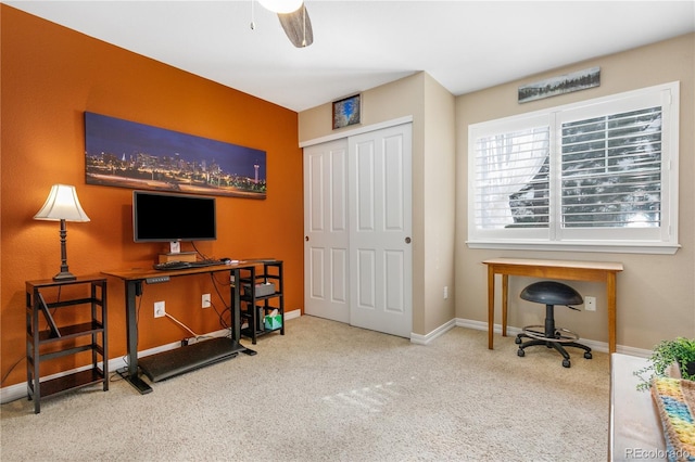 carpeted office with baseboards