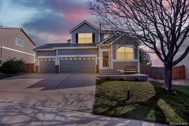 11575 Wilson Cir, Parker, CO 80134 - traditional-style home featuring concrete driveway, brick siding, and a garage