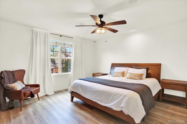 11575 Wilson Cir, Parker, CO 80134 - bedroom with light wood-style floors and ceiling fan