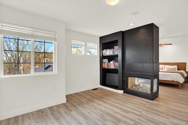 11575 Wilson Cir, Parker, CO 80134 - unfurnished living room featuring wood finished floors and baseboards