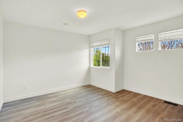 11575 Wilson Cir, Parker, CO 80134 - spare room with baseboards and light wood finished floors
