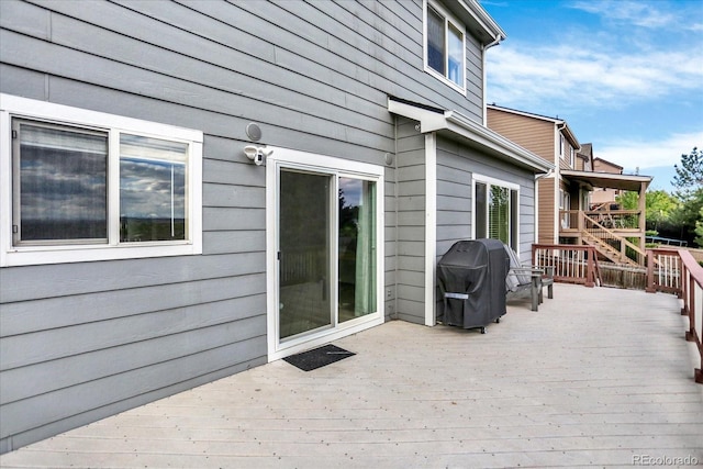 11575 Wilson Cir, Parker, CO 80134 - wooden terrace with a grill and stairs