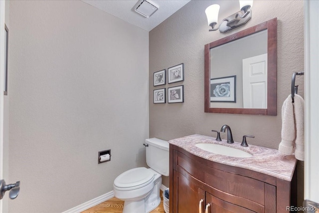 16642 W Archer Ave, Golden, CO 80401 - bathroom with vanity and wood finished floors