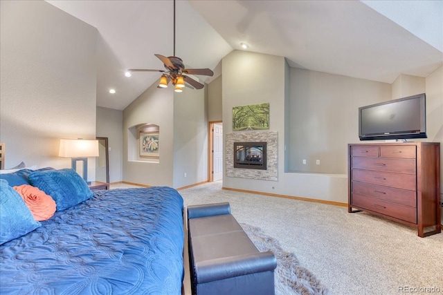 16642 W Archer Ave, Golden, CO 80401 - bedroom featuring vaulted ceiling, carpet, a multi sided fireplace, a ceiling fan, and recessed lighting