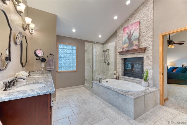 16642 W Archer Ave, Golden, CO 80401 - ensuite bathroom with a stall shower, a bath, double vanity, recessed lighting, and vaulted ceiling