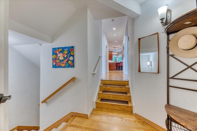 16642 W Archer Ave, Golden, CO 80401 - staircase featuring wood finished floors and lofted ceiling