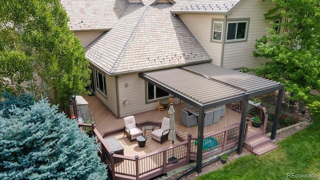 16642 W Archer Ave, Golden, CO 80401 - back of property with a deck and an outdoor living space