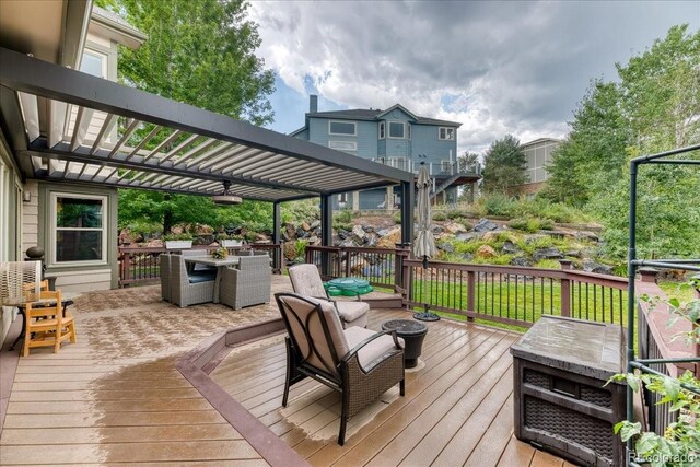 16642 W Archer Ave, Golden, CO 80401 - deck with outdoor dining area and a pergola