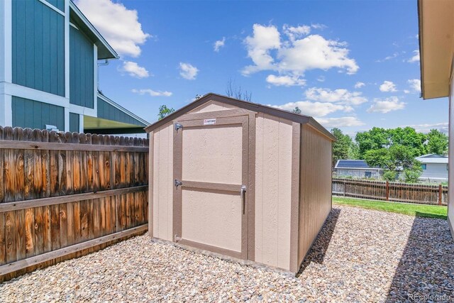 9015 W Tanforan Dr, Littleton, CO 80123 - view of shed featuring a fenced backyard