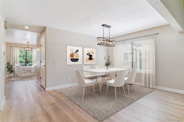 9015 W Tanforan Dr, Littleton, CO 80123 - dining area with a chandelier, light wood-type flooring, and recessed lighting