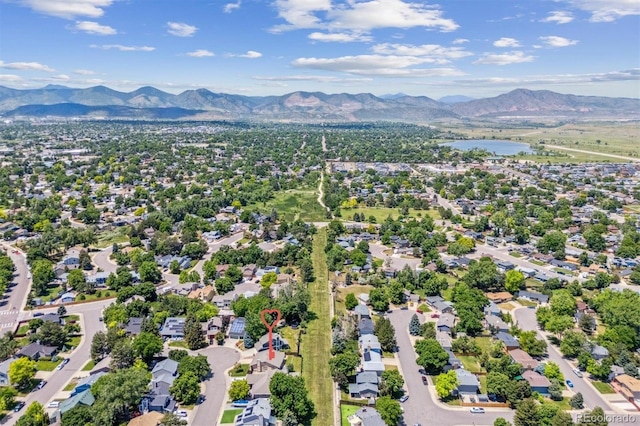 9015 W Tanforan Dr, Littleton, CO 80123 - aerial view of a water and mountain view